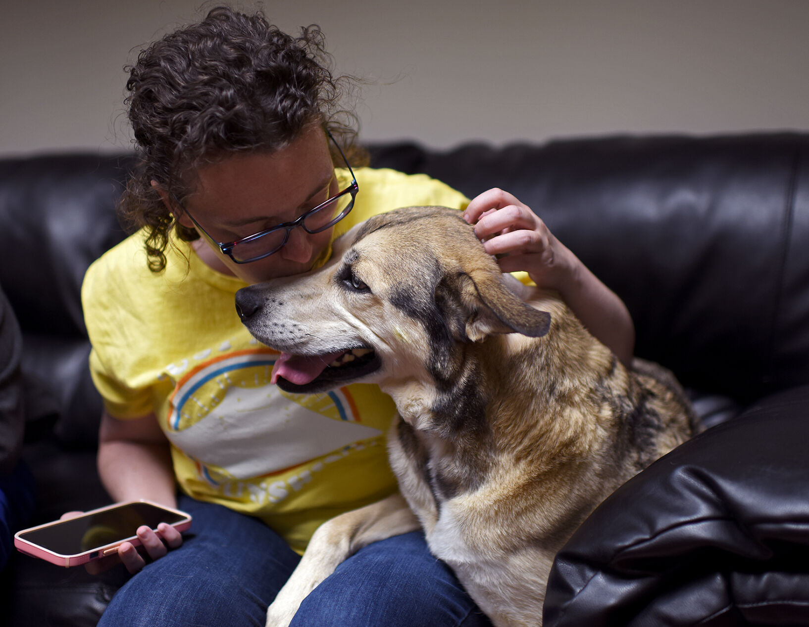 Sarah Hicks sits with Keylo
